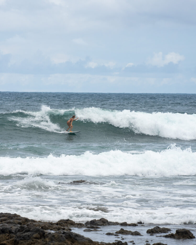 Surfer taking on the waves of Playa Negra.